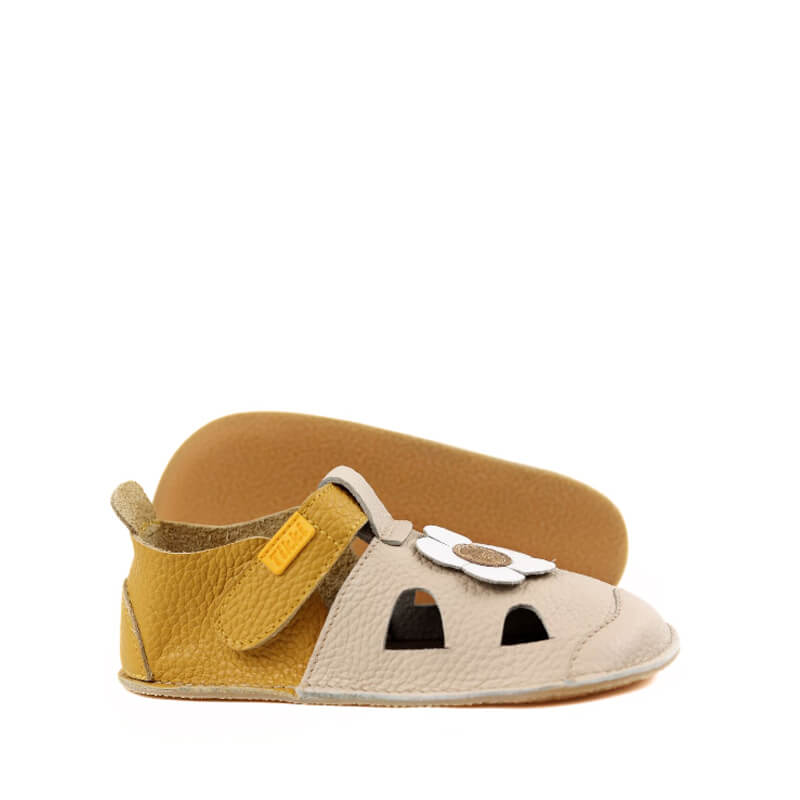 Pair of Tikki Kids Nido Sandals - Daisy, one showing the outer side and the other showing the sole view.