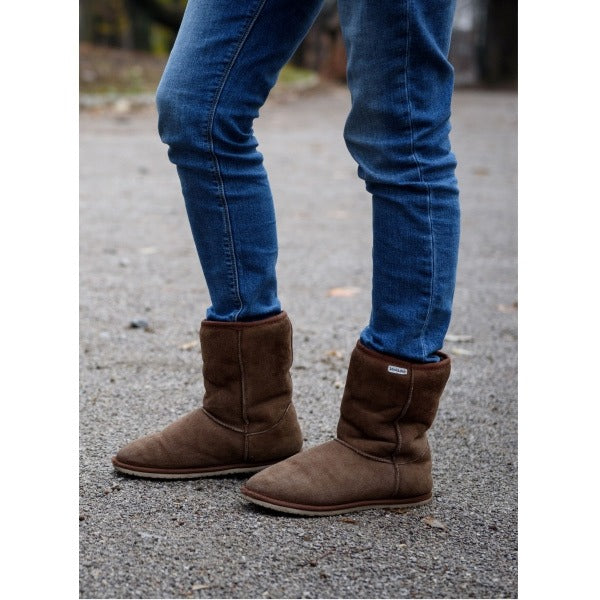 Person wearing Zeazoo Women's Boots Dingo - Brown with denim jeans.