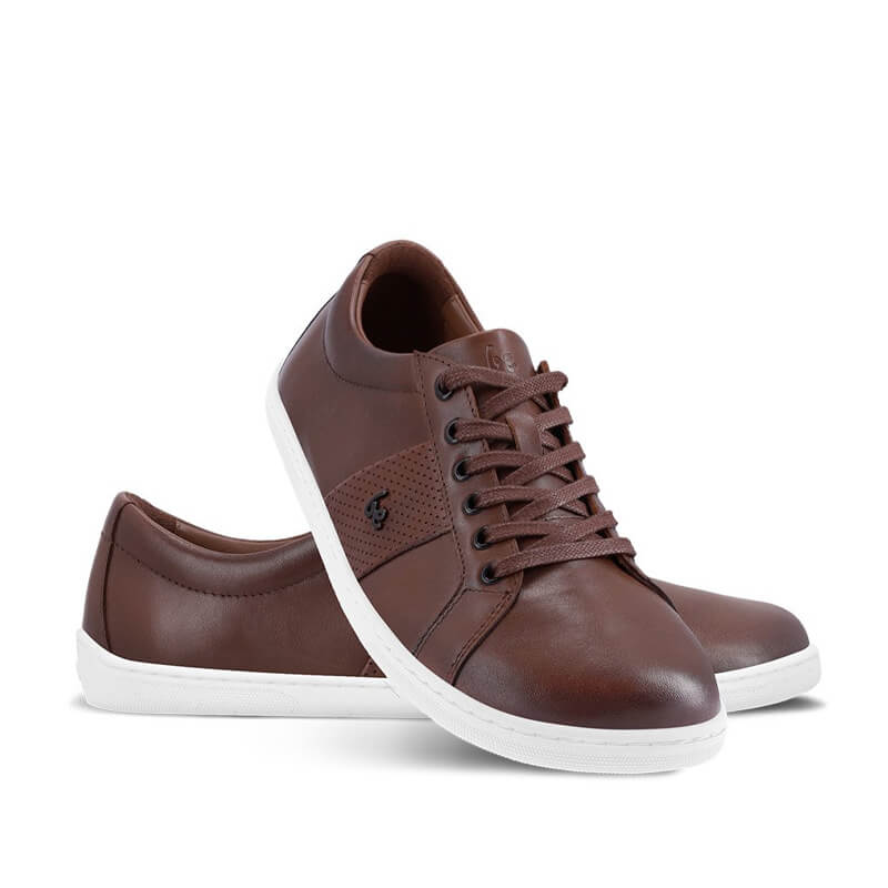 Pair of Be Lenka Adults Trainers Elite - Dark Brown, one angled and leaning showing the outer side, the other partially showing the inner side