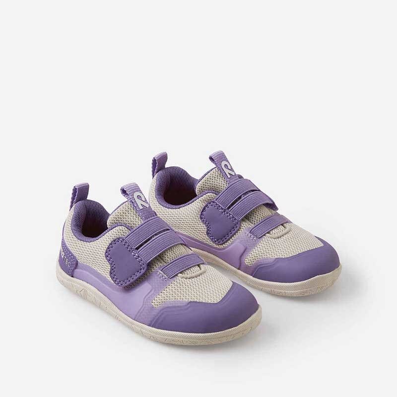 Pair of Reima Kids Trainers Tepastelu - Light Beige, angled view showing outer and inner side and front.
