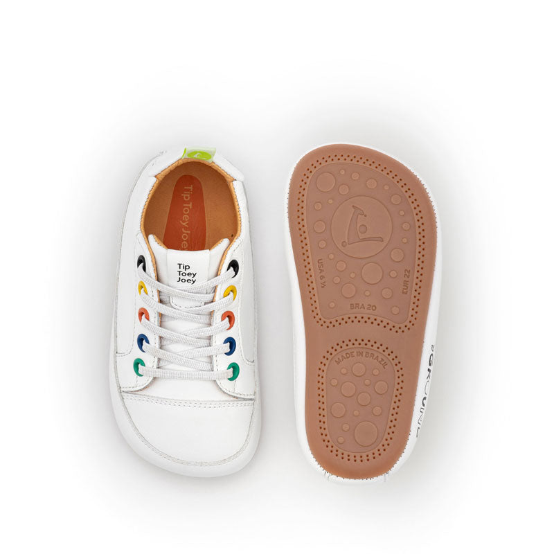 Pair of Tip Toey Joey Kids Trainers Funky Playground - White, one showing the top view and other showing the sole view.