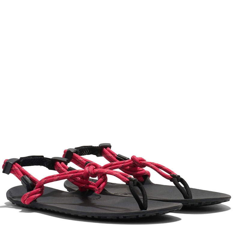 Pair of Xero Women's Huarache Sandals Genesis - Raspberry, angled view showing outer side and front.