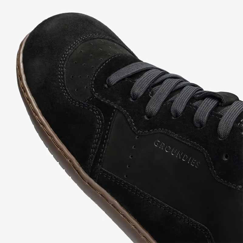 Groundies Adults Nova GO1 Trainer in black, close up of outer side.