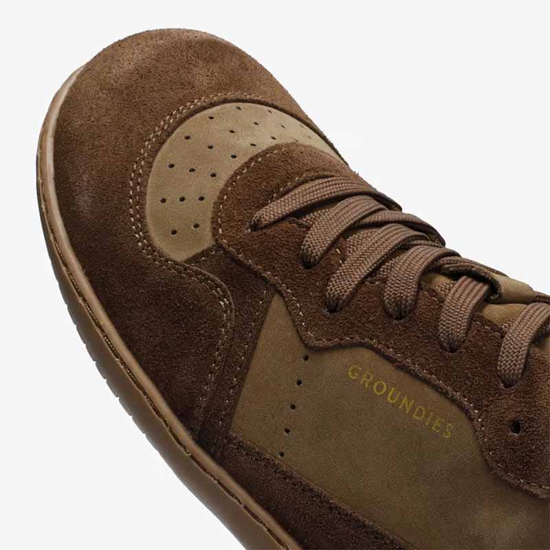 Groundies Adults Nova GO1 Trainer in chocolate, close up of outer side.