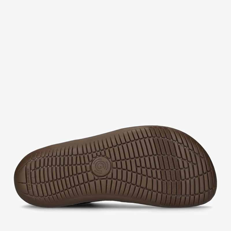 Groundies Adults Nova GO1+ Trainer in black, sole view.