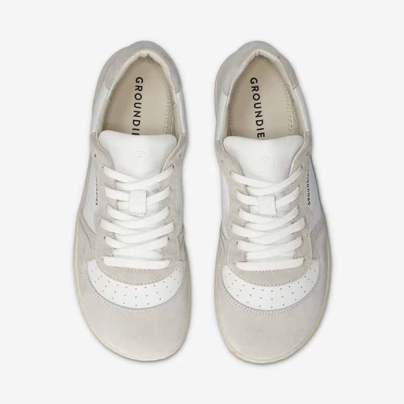 Pair of Groundies Adults Nova GO1 Trainers - White/Off-White, top view.