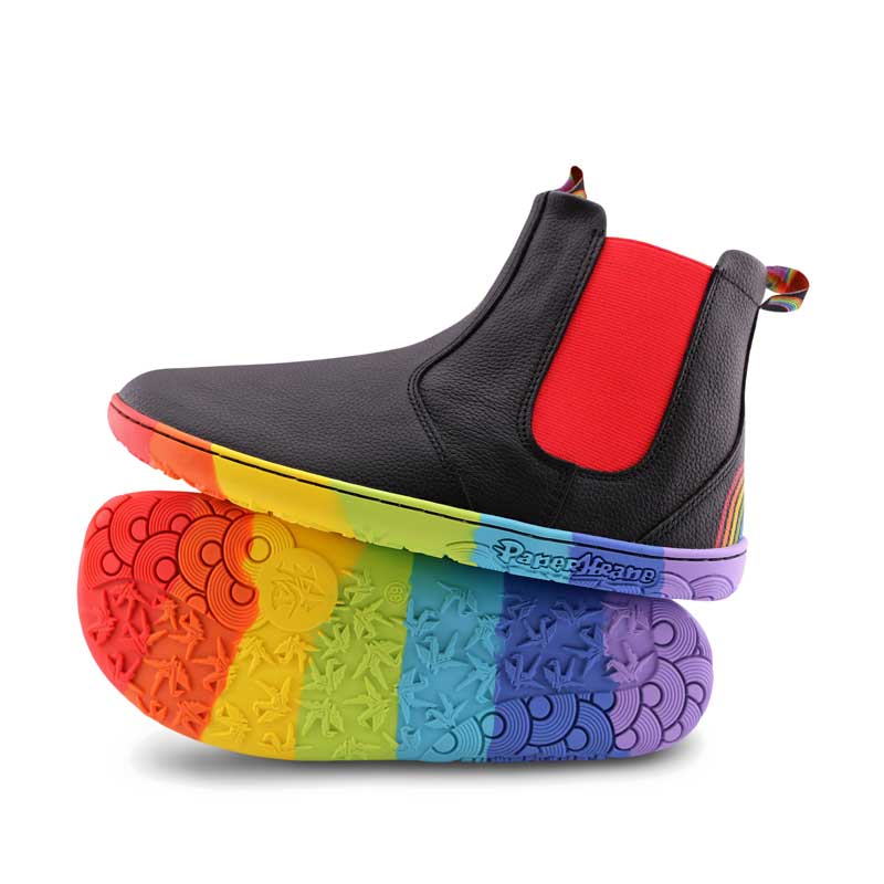 Pair of PaperKrane Adults Jewelchic Chelsea Boots in black, one showing the outer side and the other on it's side showing the sole.