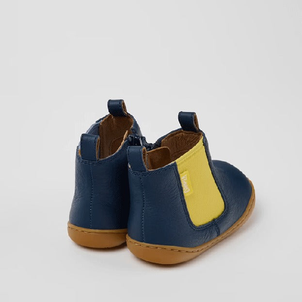 Pair of Camper Kids Peu Twins Chelsea Boots in blue, angled view showing outer side and rear.