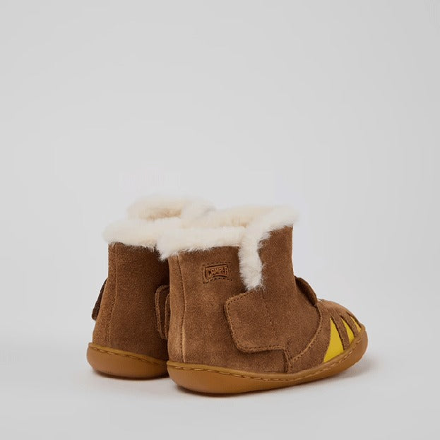 Pair of Camper Kids First Walker Peu Nubuck and Leather Ankle Boots - Brown, angled view showing outer side and rear.