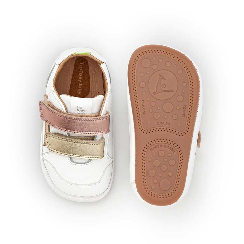 Pair of Tip Toey Joey Kids Trainers Landy - White Champagne Rose Gold, one showing the top view and the other showing the sole view.