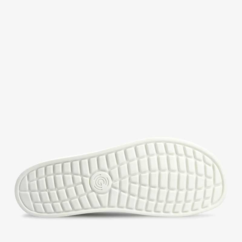 Groundies Adults Universe Trainer in black and white, sole view.