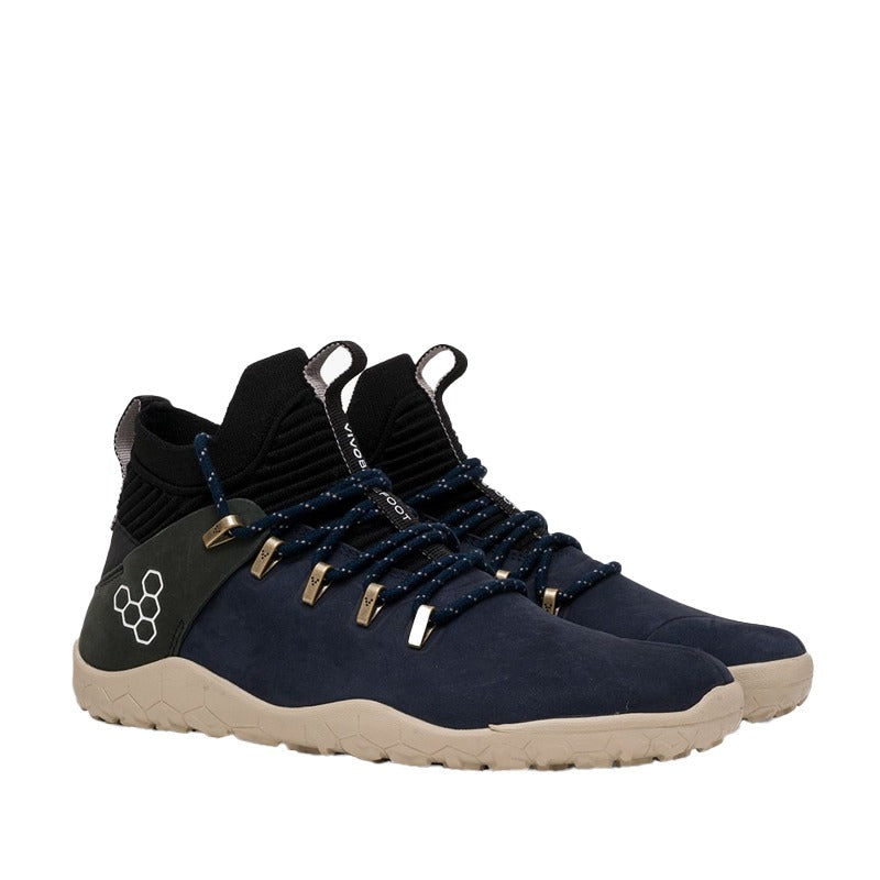 Pair of Vivobarefoot Women's Magna Trail FG - Dress Blue, angled view showing the outer side and front.