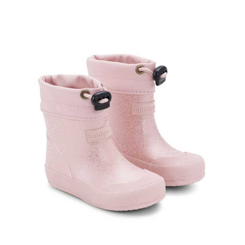 Pair of Bundgaard Toddler Wellies Malik in rose sparkle, angled view showing outer side and front.