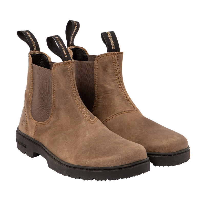 Pair of El Naturalista Barefoot Arizona Nomada Chelsea Boots - Stone, angled view showing outer side and front.