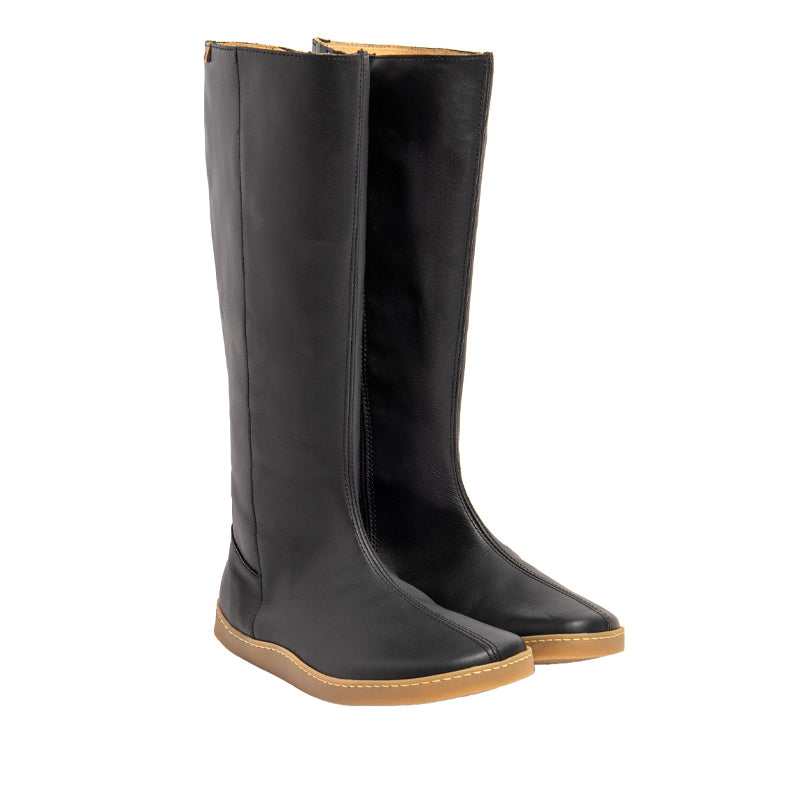 Pair of El Naturalista Barefoot Nappa Origen Boots - Black, angled view showing outer side and front.