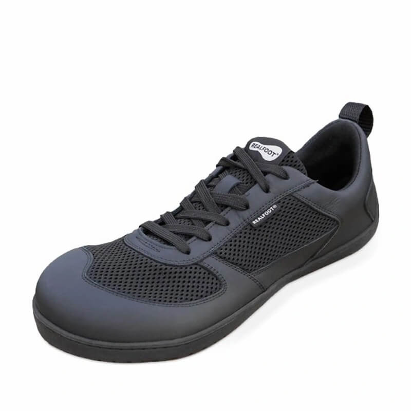 Realfoot Adults Trainer Natural Runner - All Black, angled view showing front and outer side.