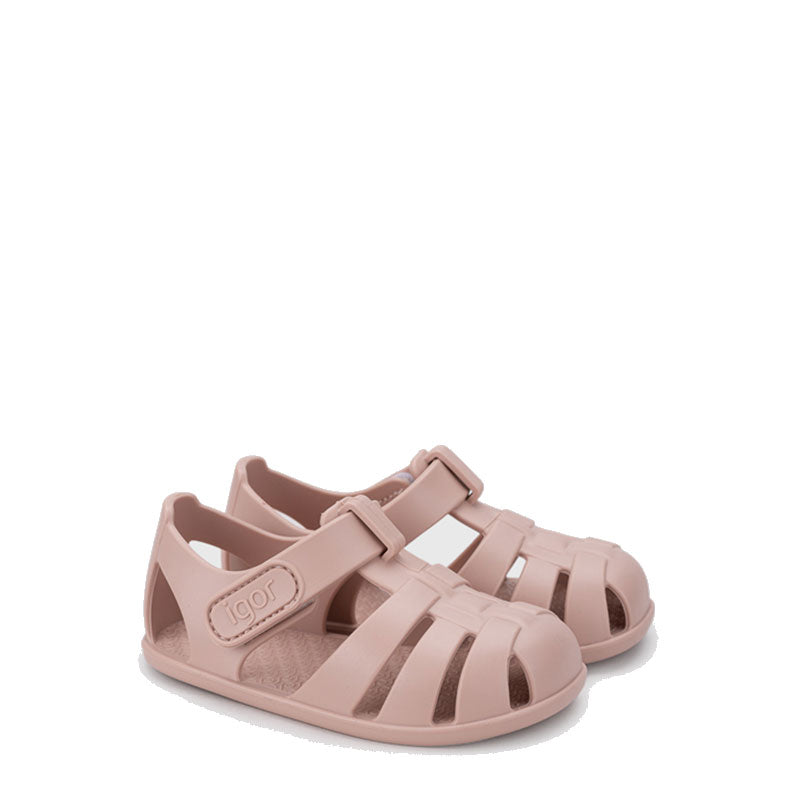 Pair of Igor Nemo Jelly Shoes in soft pink, angled view showing outer side and front
