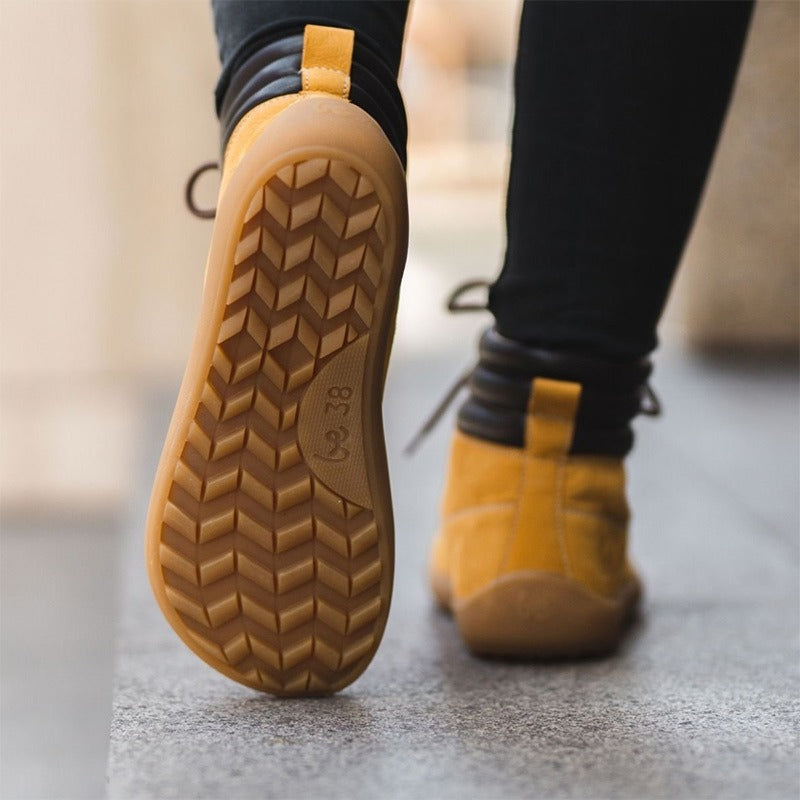 Person wearing Be Lenka Adults Boots Nevada Neo - Mustard, sole and rear view