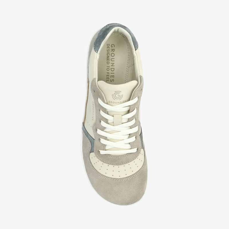 Groundies Adults Nova GO1 Trainer in beige and green, top view.