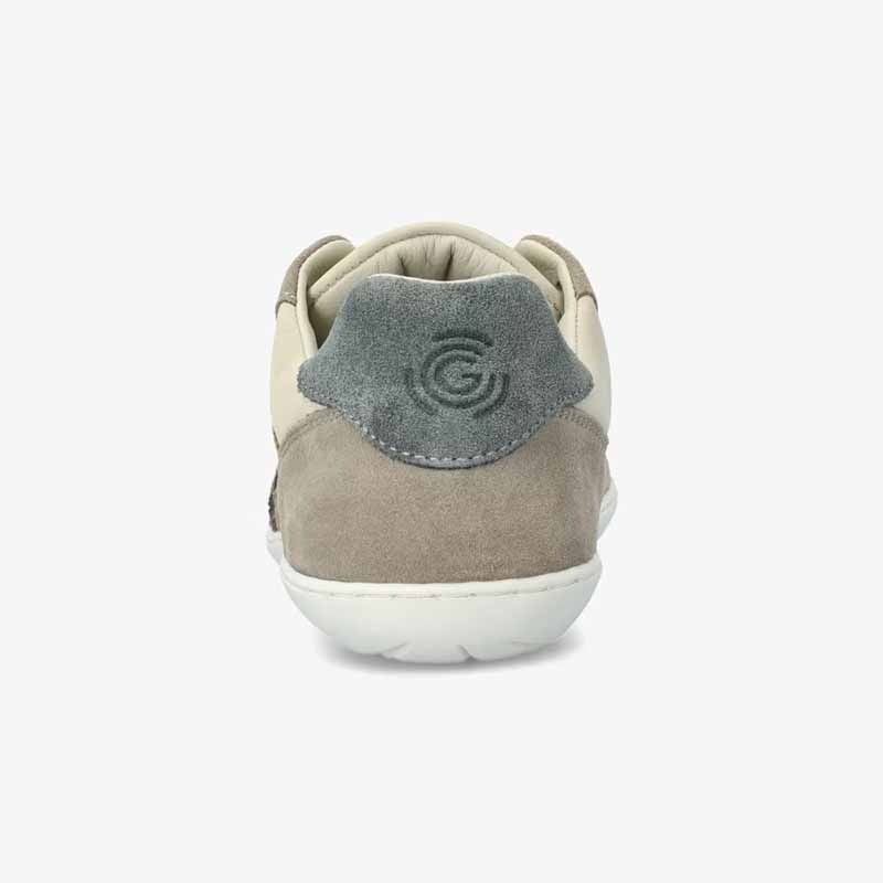 Groundies Adults Nova GO1 Trainer in beige and green, rear view.