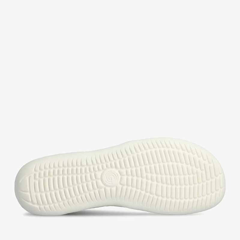 Groundies Adults Nova GO1 Trainer in beige and green, sole view.