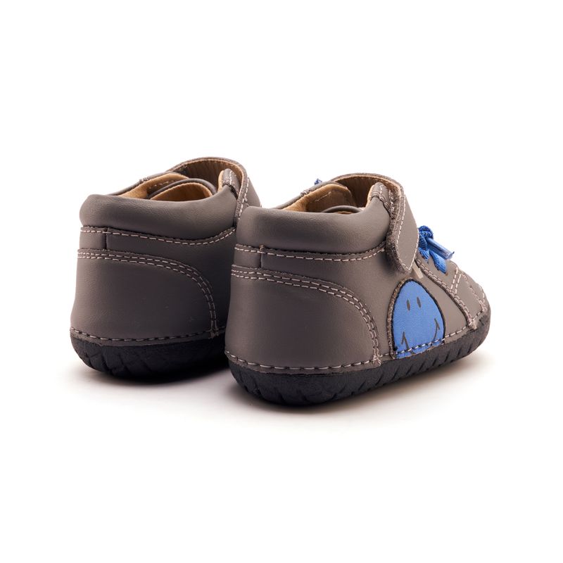 Pair of Old Soles Smiley Pave Shadow Boots - Neon Blue, angled showing outer side and rear.