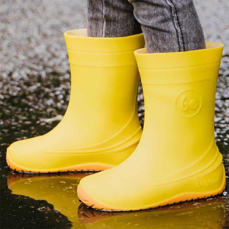 Person wearing Be Lenka Kids Wellies Pudds - Yellow, side view