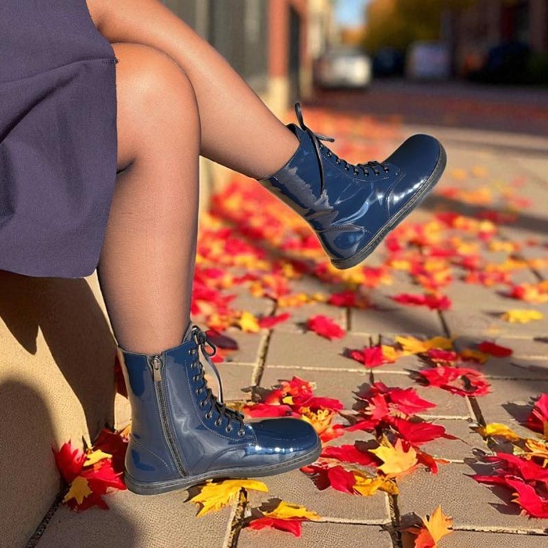 Person wearing Peerko Adults Boots Pulse - Lapis.