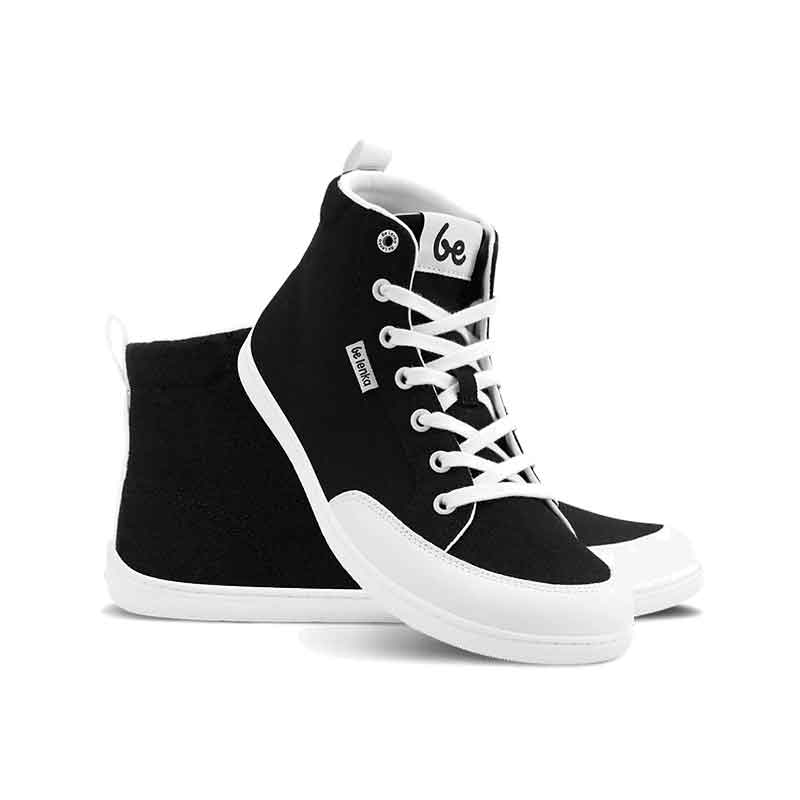 Pair of Be Lenka Adults High Top Trainers Rebound - Black and White, one angled and leaning showing the outer side, the other partially showing the inner side