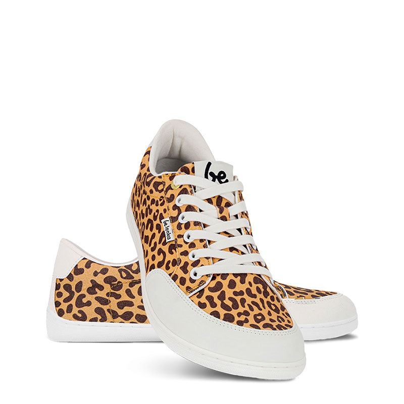 Pair of Be Lenka Adults Trainers Rebound - Leopard, one angled and leaning showing the outer side, the other partially showing the inner side
