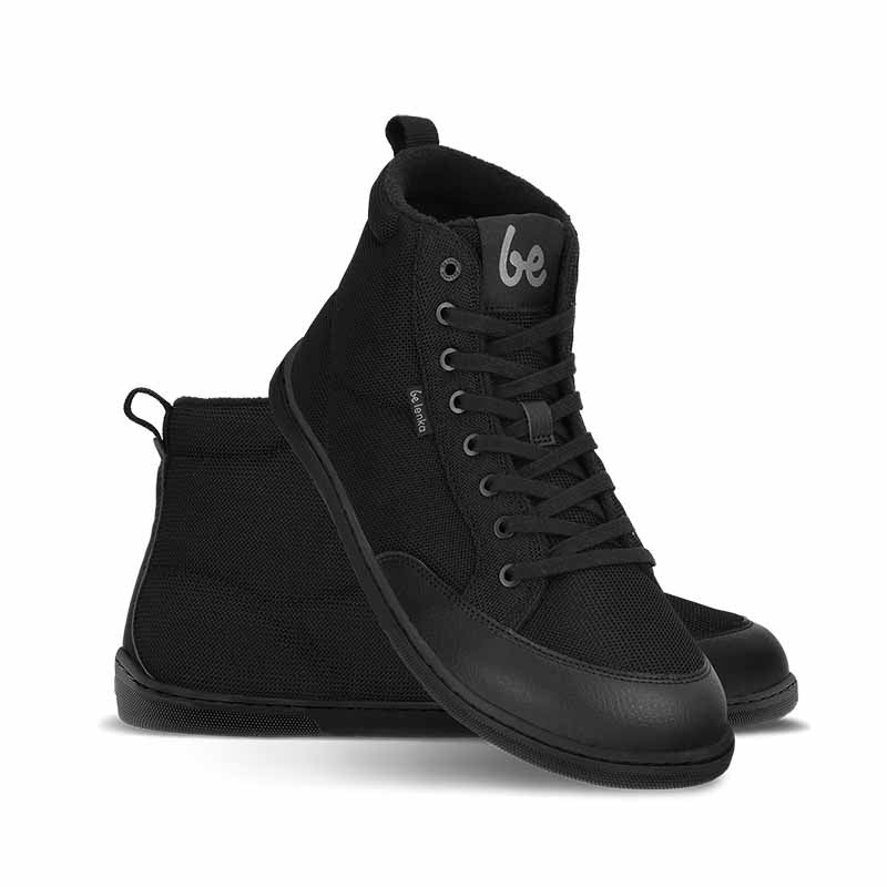 Pair of Be Lenka Adults Boots Rebound Thermo - Black, one angled and leaning showing the outer side, the other partially showing the inner side