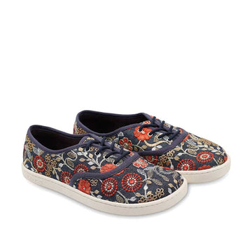 Pair of Tikki Women's Trainers Reed - Bluebell, angled view showing outer side and front.
