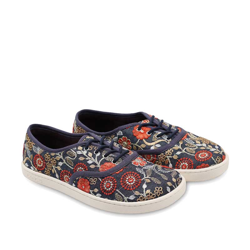 Pair of Tikki Women's Trainers Reed - Bluebell, angled view showing outer side and front.