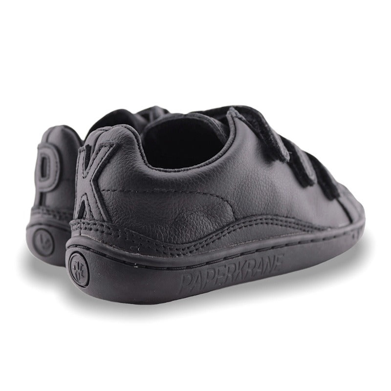 Pair of PaperKrane Kids Ruler Shoes in black, angled view showing outer side and rear.