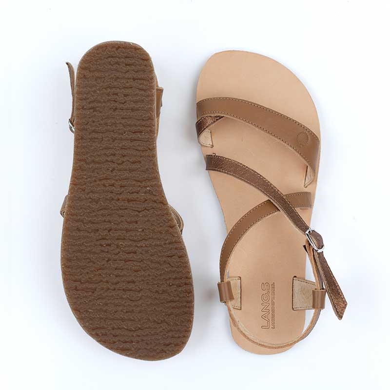 Pair of Tikki Women's Sandals Selene - Camel, one showing the sole and the other showing the top view.