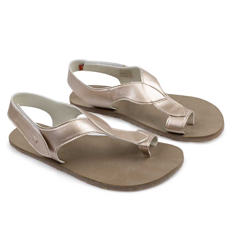 Pair of Tikki Women's Sandals Soul - Vegan Shimmer, angled view showing outer side and front.