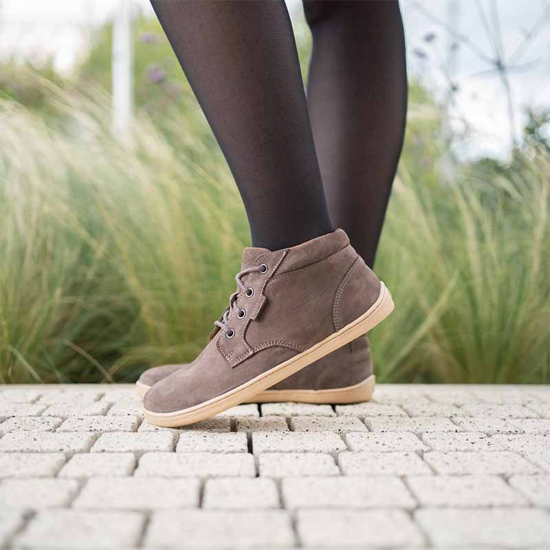 Person wearing Be Lenka Adults Shoes Synergy - Chocolate and Beige with black tights