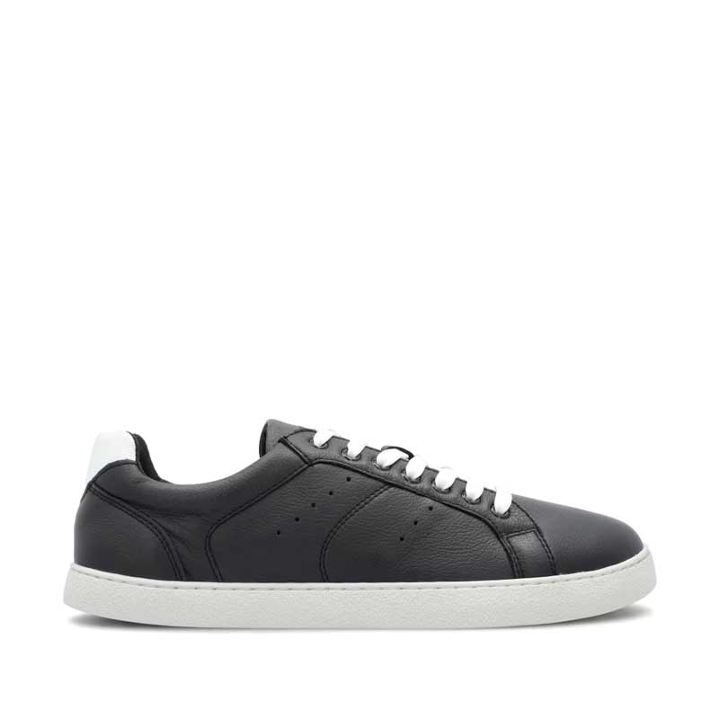 Groundies Adults Universe Trainer in black and white, outer side view.