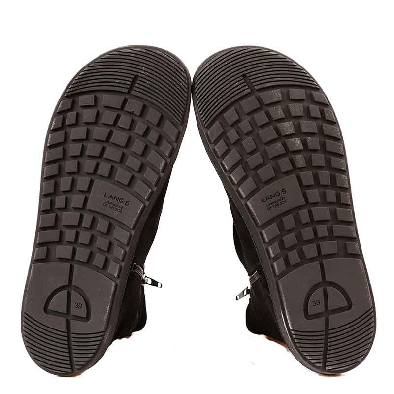 Pair of Tikki Lang.S Women's Velvet Boots - Black, sole view.