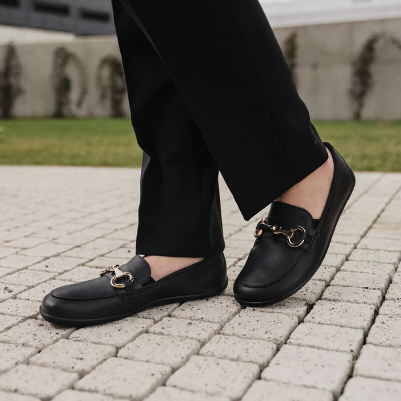 Person wearing Be Lenka Women's Moccasins Viva - Black, inner and outer side view