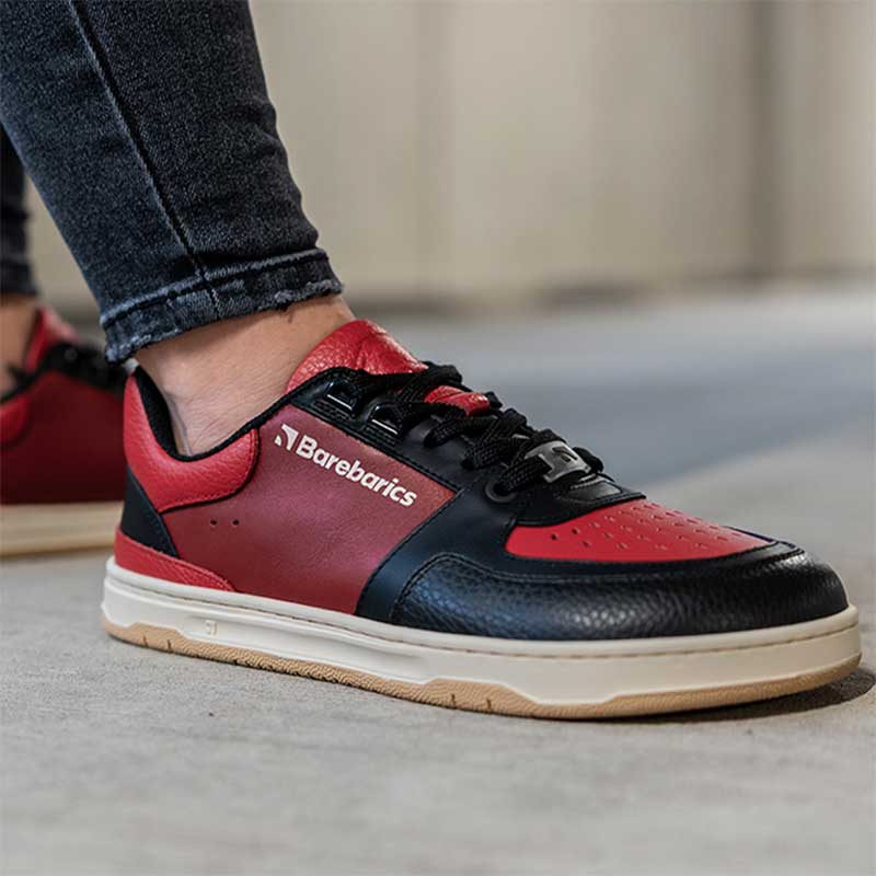 Person wearingBe Lenka Adults Barebarics Trainers Wave - Black and Red with black jeans