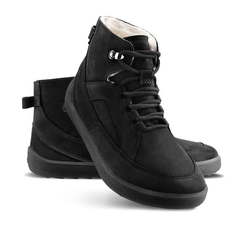 Pair of Be Lenka Adults Boots York - All Black, one angled and leaning showing the outer side, the other partially showing the inner side