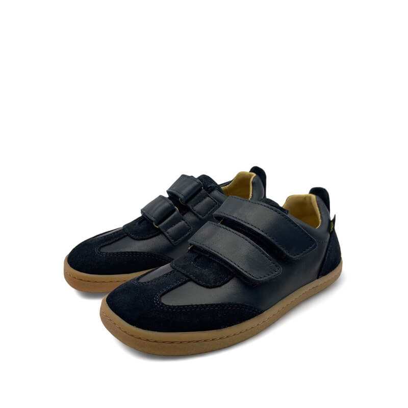 Pair of Young Soles Kids Trainers Pele - Navy, angled view showing outer side and front.