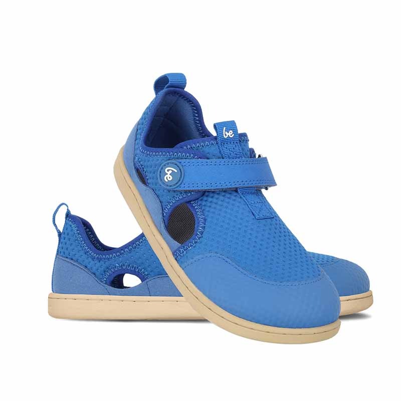 Pair of Be Lenka Kids Sandals Zest - Blue, one angled and leaning showing the outer side, the other partially showing the inner side