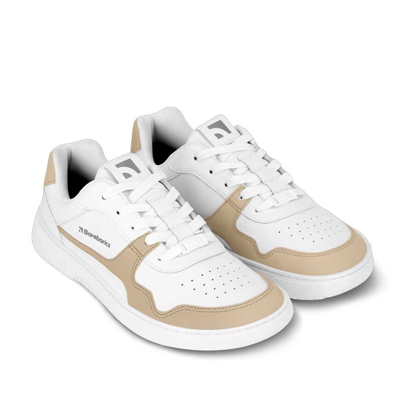 Pair of Be Lenka Adults Barebarics Leather Trainers Zing - White and Cream, angled view showing outer side and top with laces