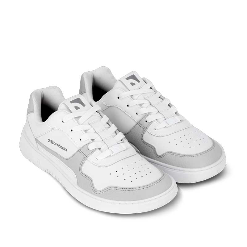 Pair of Be Lenka Adults Barebarics Leather Trainers Zing - White and Light Grey, angled view showing outer side view and top view with laces